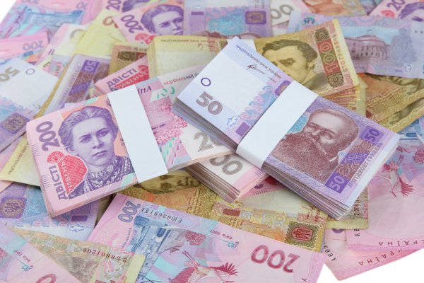 depositphotos 28797813 stock photo pile of ukrainian money